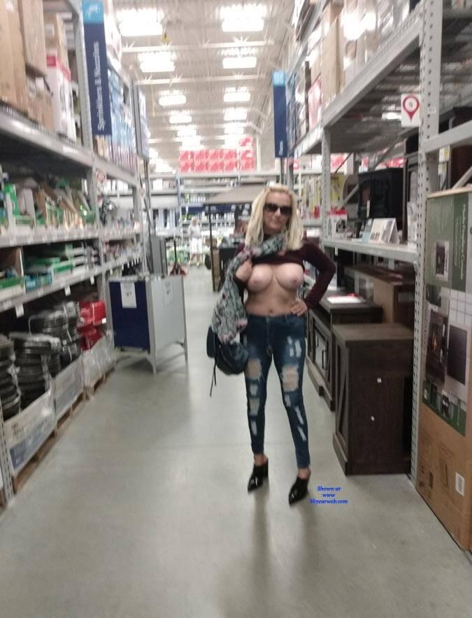 grandmother flashing her tits and pussy in department store picture 2
