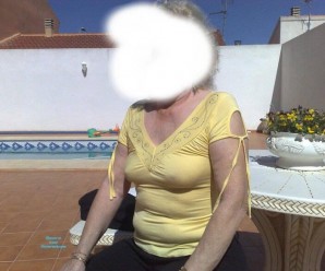 hot anonymous granny flashing a bit of her old tits